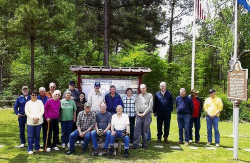Tour group poses at the Peason Memorial Park for a picture. (Rickey Robertson Collection)
