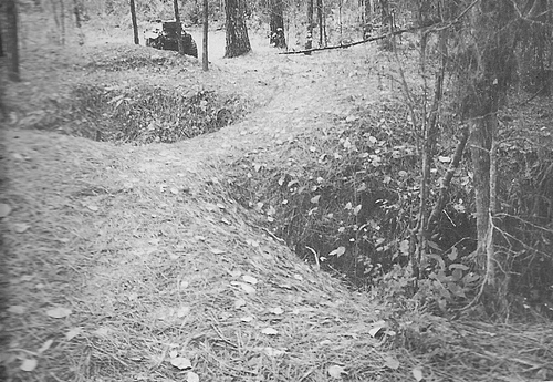 Picture of Murrell’s Caves in the Clearwater Community. Treasure hunters digging down into the caverns left the large holes.