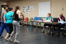 SFA theatre professor Angela Bacarisse, second from right, instructs students as they rehearse for the SummerStage Festival production of 