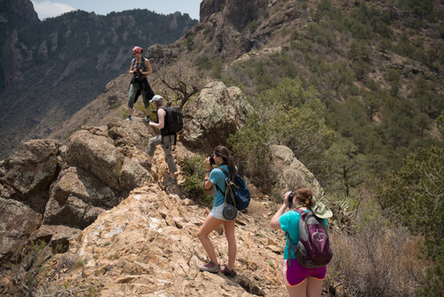 SFA photography students Jade Jones, Natalie Welch, Olivia Hopkins and Shelby Ricks photograph the Chisos Basin in Big Bend National Park.