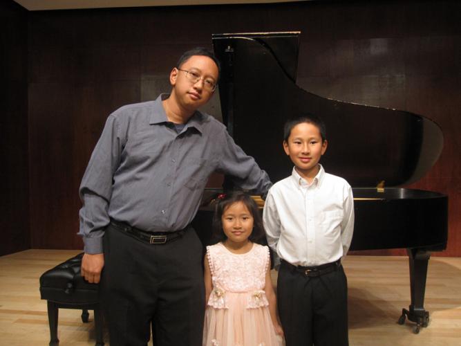 Mario Ajero with his children, Olivia and Antonio