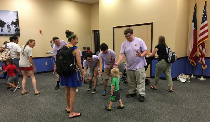 SFA theatre students interact with young children at the Judy B. McDonald Public Library