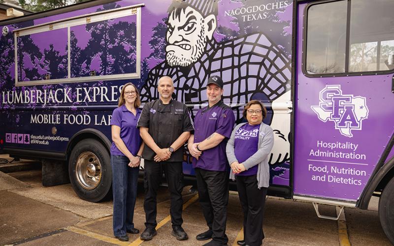Faculty with the Lumberjack Express Mobile Food Lab