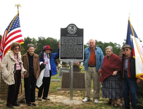Descendants of pioneers assist in the unveiling. Left to right are Ruth Cole, Navoleine Roddy, Mae Gene Pettit, Vernon Willingham, Vivian Hendrick and Charlie Willingham.