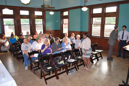 Patrons preparing for LTC Reichert's speech.
