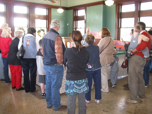 Large group inspects the model trains.
