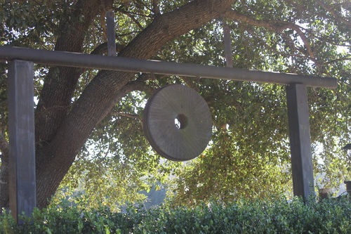 Old Millstone at Entrance