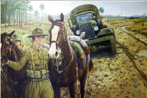 Slideshow Photo 4919Cavalry troopers assisting other soldiers who ‘s truck has become stuck in the Louisiana mud. Painting on display at Fort Polk, La.