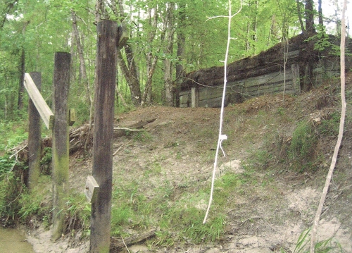 The old bridge pilings and abutment is still standing on Sandy Creek that was built by the US Army in 1940.