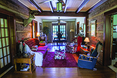  Part of the Saunders’ home dates from the 1800s, when Richard's ancestors settled in Anderson County. The walls of the original home are massive hand-hewn pieces of East Texas timber, and adorned with antiques from the family’s history.