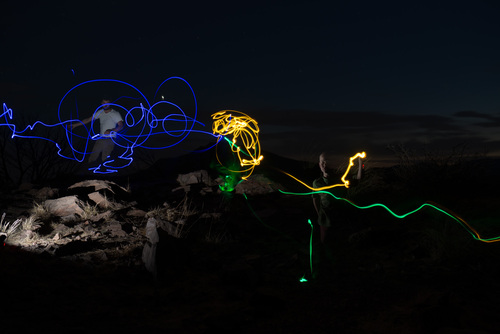 Shortly after sunset at David Mountains State Park, students 'paint' with light in the landscape.