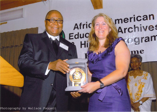 Dr. Roberts presenting award to Dr. Beisel