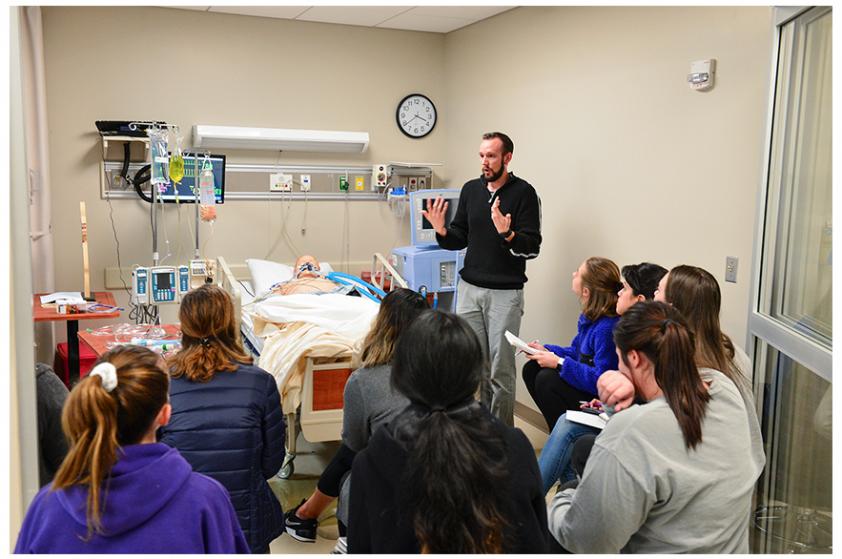 Justin Pelham with SFA nursing students