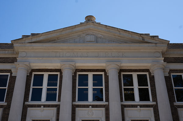Image of the front exterior of Rusk Building, looking up