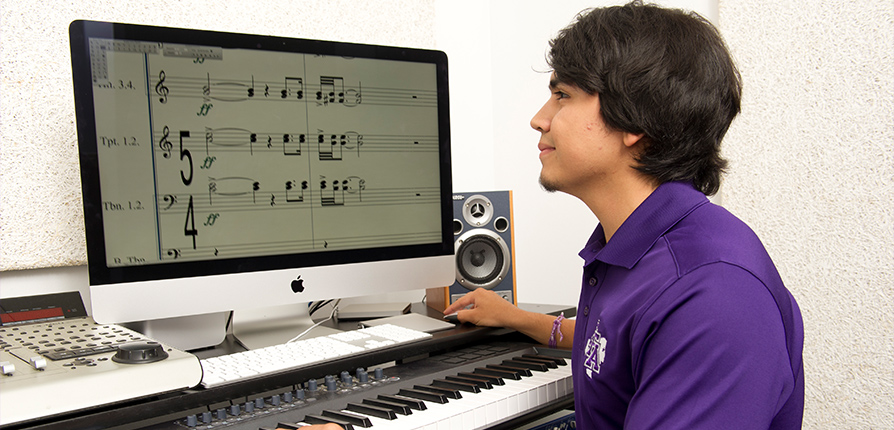 Student using composing music programs