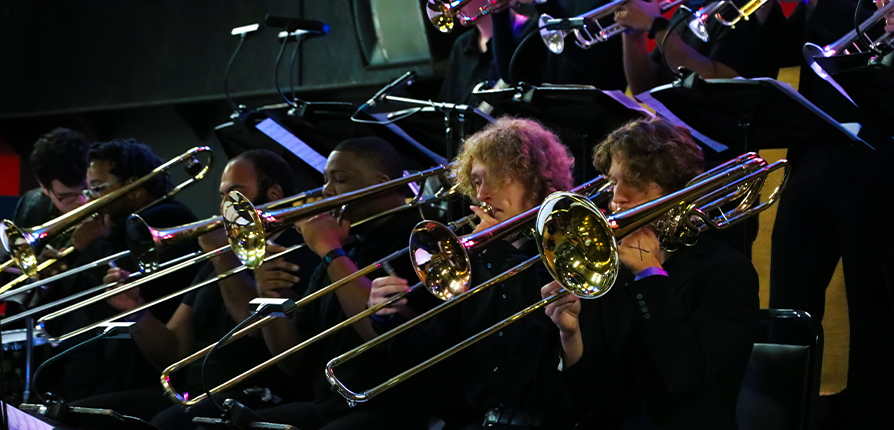 Group of people playing trombone