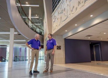 Dr. Gary Wurtz, right, dean of Stephen F. Austin State University’s Micky Elliott College of Fine Arts, and Bill Elliott, fine arts and SFA benefactor, admire the beautiful interior of the newly renovated and expanded Griffith Fine Arts Building.