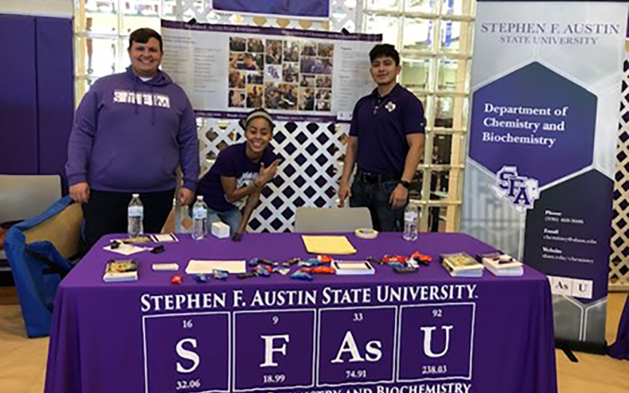 Chemistry students at a tabling event