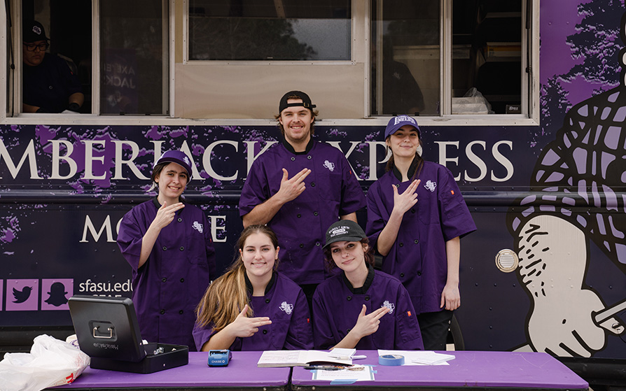 Students in front of the Lumberjack Express Mobile Food Lab
