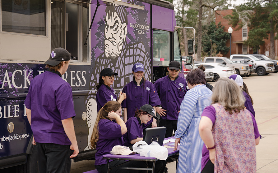 More customers at the Lumberjack Express Mobile Food Lab