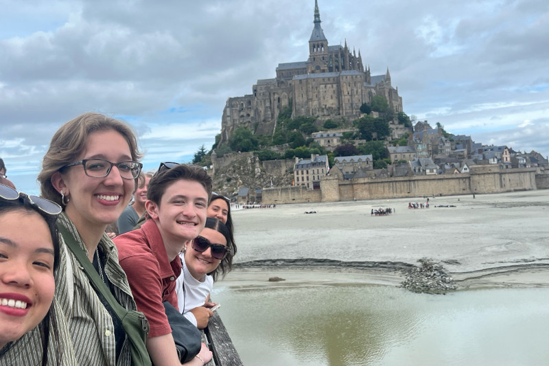 SFA students take a selfie in front of a French landmark