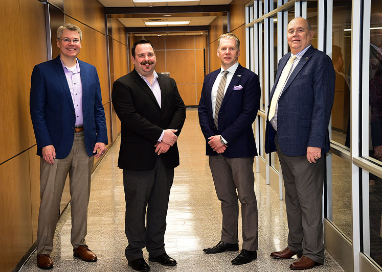 Left to Right: Dr. Marcus Cox, director of Business and Community Services; Matt Smilor, director of the Arnold Center for Entrepreneurship; Dr. Mikhail Kouliavtsev, director of the Center for Business and Economic Research; and Larry Cain, director of the Small Business Resource Hub
