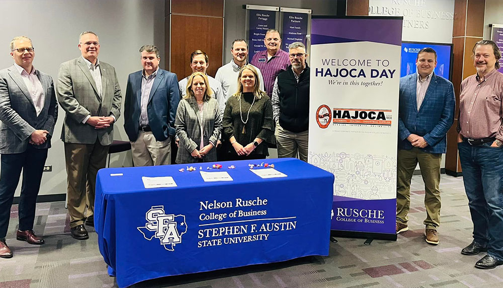 Hajoca representatives posing with Dean Bisping, associate deans and department chairs
