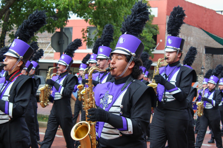 Members of the LMB march in a parade