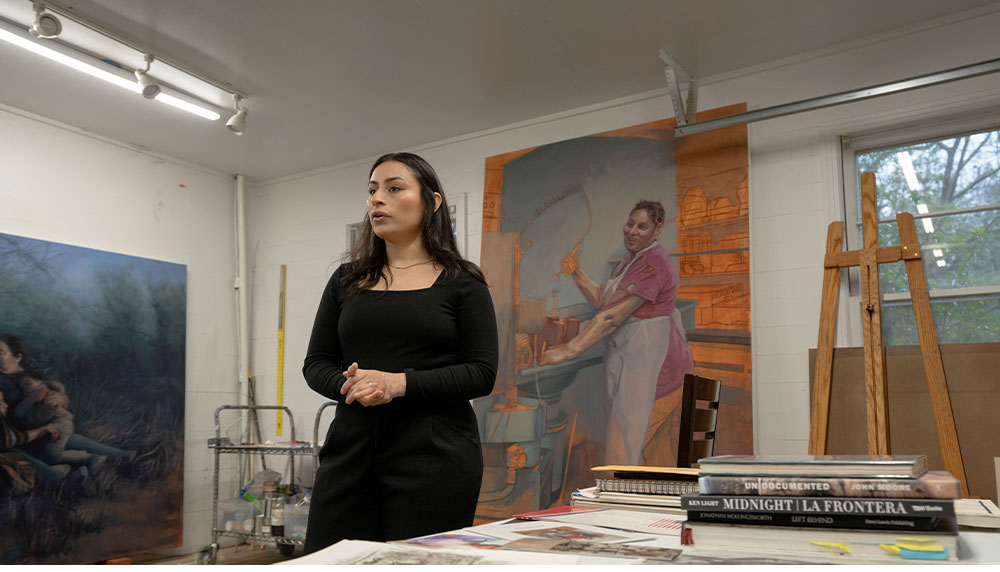 Arely Morales talking in her studio