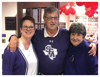 From left, Rhonda Minton with Bob Sitton, executive director emeritus of SFA alumni relations, and Betty Ford, former assistant to the director, during Homecoming 2021.