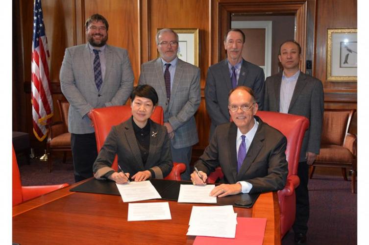 Pictured standing from left are Dr. Matthew McBroom, associate dean of SFA’s Arthur Temple College of Forestry and Agriculture; Dr. Hans Williams, dean of the Arthur Temple College of Forestry and Agriculture; Dr. Steve Bullard, provost and vice president for academic affairs at SFA; and Dr. Qingfan Meng, dean of Beihua University’s College of Forestry. Seated from left are Dr. Zhan Liping, vice president of Beihua University and Dr. Steve Westbrook, SFA interim president.