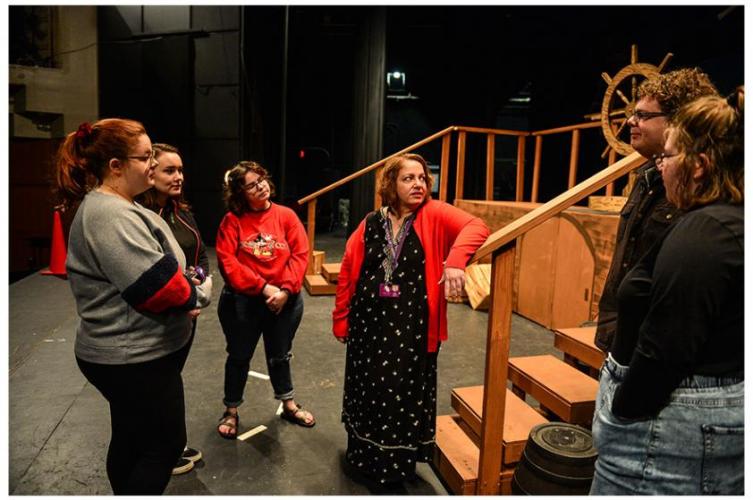 Jackie Rosenfeld, dramatic writing and theatre appreciation instructor in Stephen F. Austin State University’s School of Theatre, speaks with students about the history of opera on stage in SFA’s Turner Auditorium.