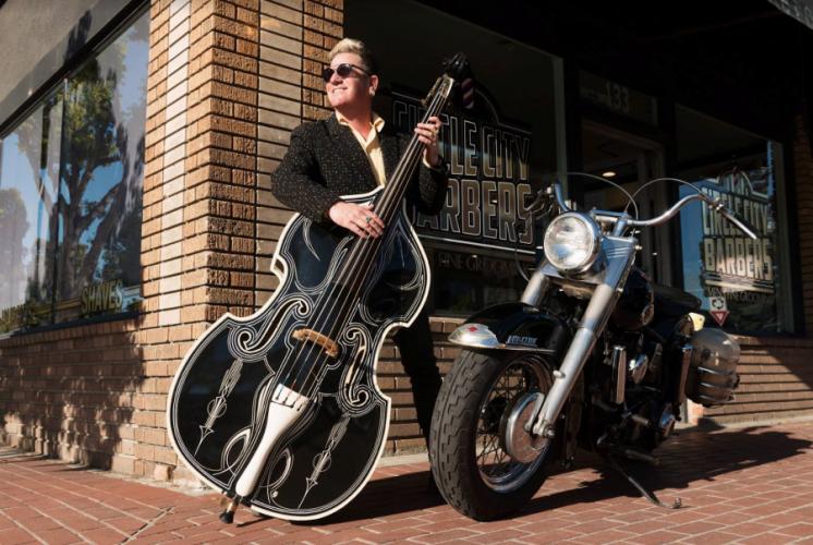 Lee Rocker with his signature upright bass and motorcycle