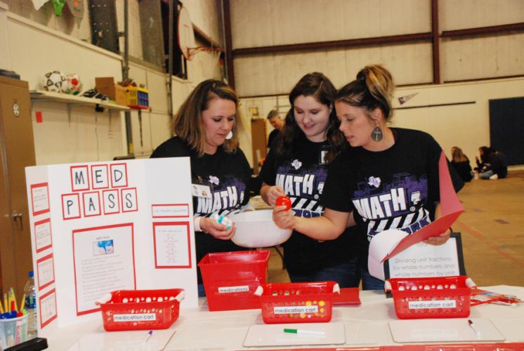 SFA elementary education majors Wensdy Maldanado, Alex Smith and Amy Almanza
