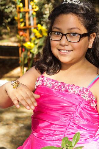 Aixa Santoyo visits with a butterfly at last year’s Little Princess Tea Party.