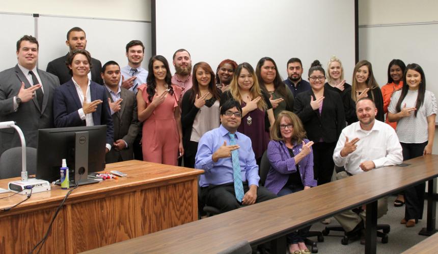 group photo of students and faculty from SFA’s Department of Management and Marketing