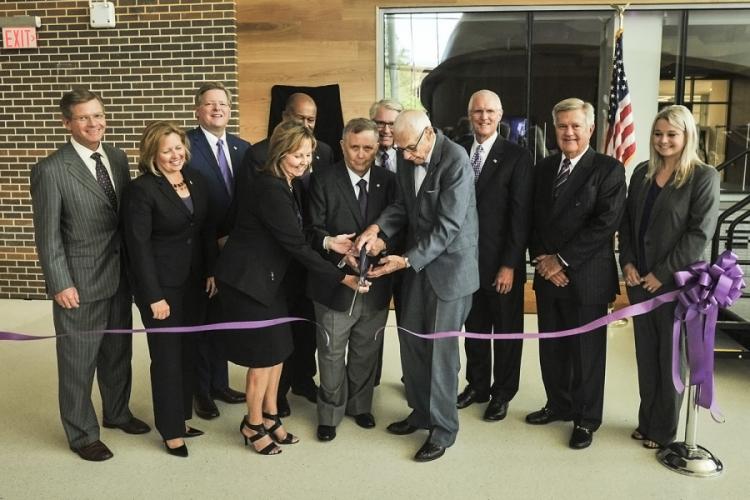 group photo of the ribbon cutting to celebrate the opening of the Ed and Gwen Cole STEM Building