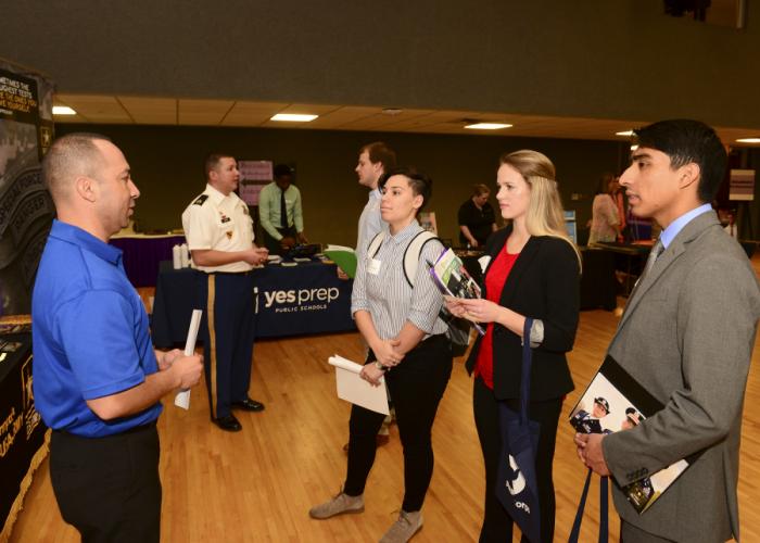 SFA STEM students Steven Choate, Tenay Barker, Lauren Kiefer and Henry Braulio network with potential employers during SFA’s first STEM Career and Internship Expo.