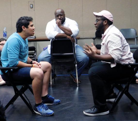 Manvel senior Edwin “EJ” Villanueva and Webster senior Tyler Canada ehearse a scene from the School of Theatre’s upcoming play, “Sweat” by Lynn Nottage.
