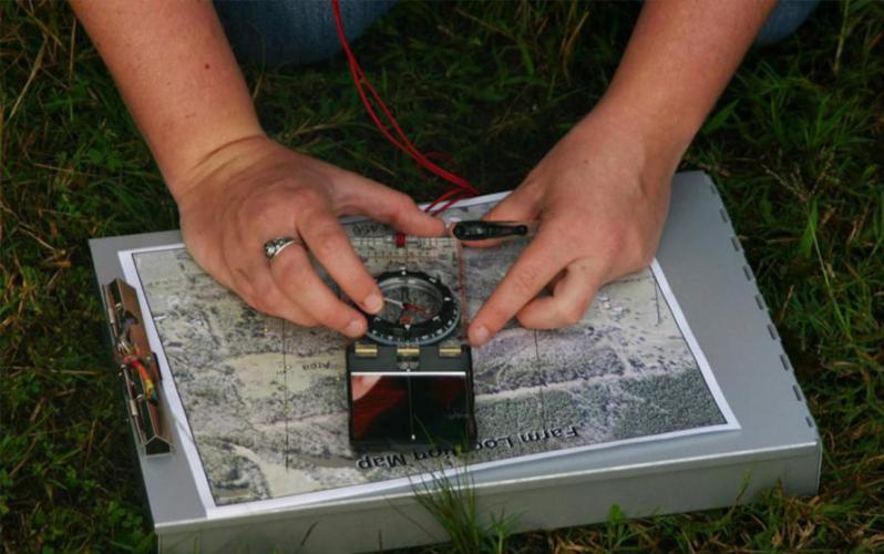 device placed over a map measuring