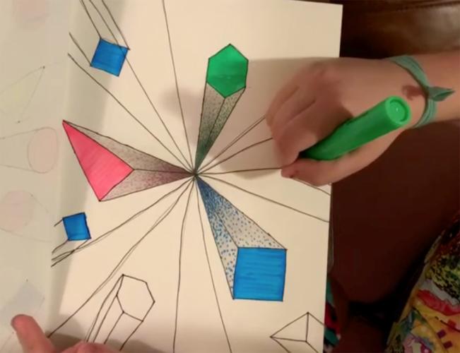 an SFA art student illustrates one-point perspective drawing