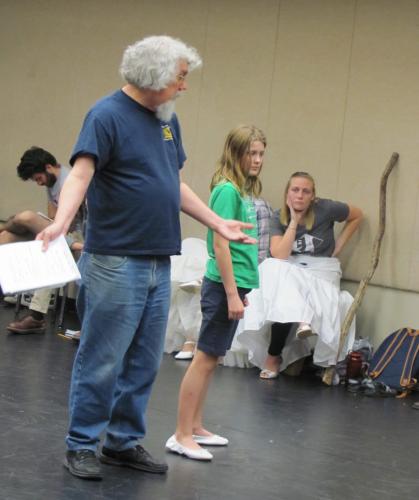 Dr. Richard Jones assists Mae Johnston, guest actor playing the role of Josie, with blocking for School of Theatre’s production of “By the Bog of Cats” while theatre student Kara Bruntz, in the lead role of Hester Swaine, looks on. 