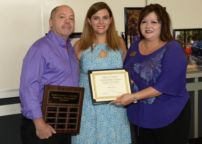 Natalie Clem, the first recipient of the Christopher J. Snyder Memorial Scholarship, pictured with Kim Luna and Michael Munro