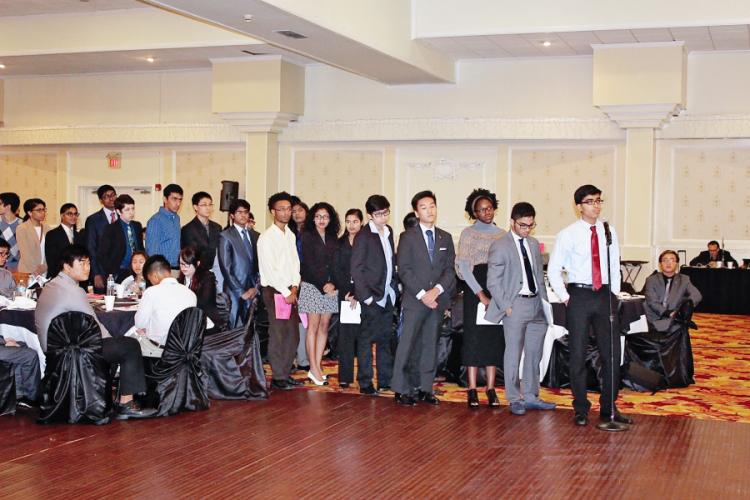 Fort Bend ISD high school seniors await their turn to ask panelists a question during the 2016 Global Citizenship Series