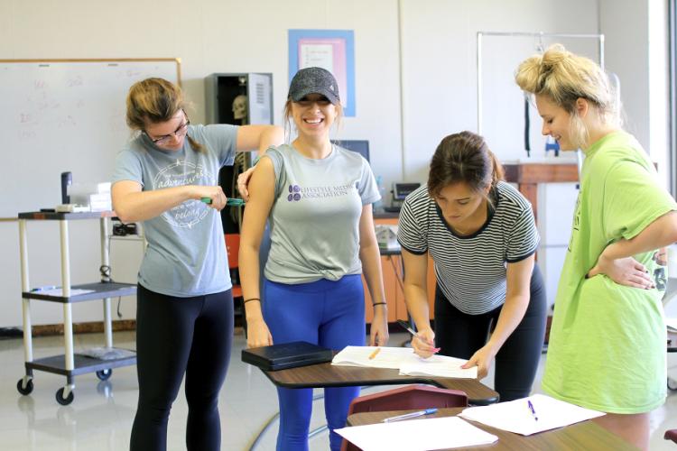 SFA students in a nutrition counseling course recently learned how to use skinfold calipers to better understand what a patient goes through in a clinical setting.