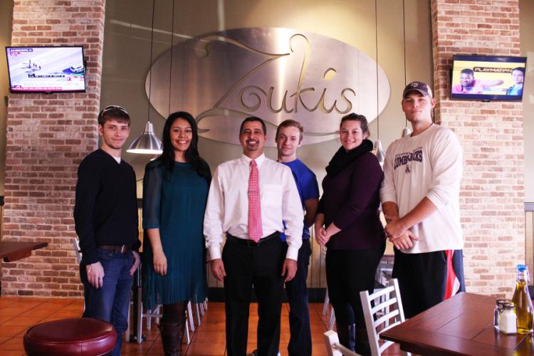 SFA students pictured with Zoukis owner Avo Dermakardijian