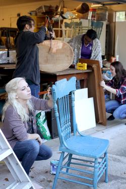 Stephen F. Austin State University senior interior design majors repurpose furniture as they prepare for the annual "Chairished" Blessings event.