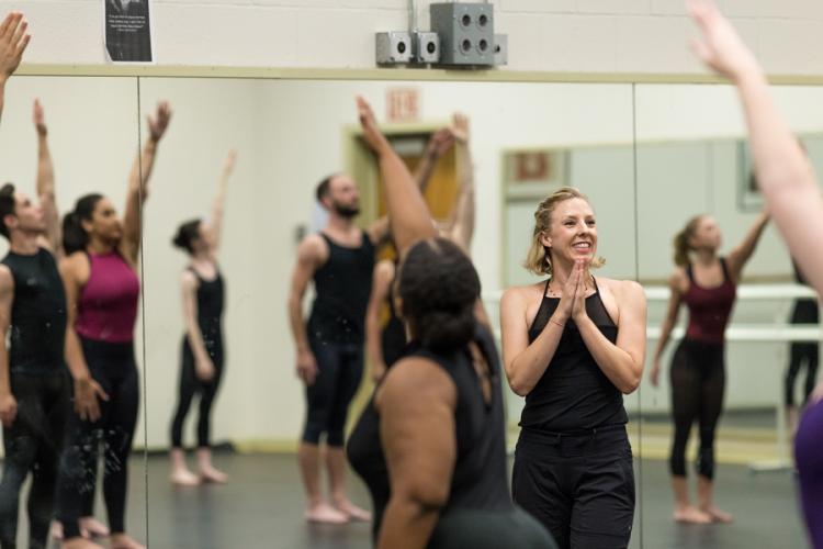 Taylor 2 dancer Amanda Stevenson applauds the work of Stephen F. Austin State University dance students during a master class the company conducted Wednesday on campus.