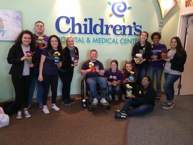 SFA student volunteers poste at the Children's Hospital and Medical Center in Omaha, Nebraska