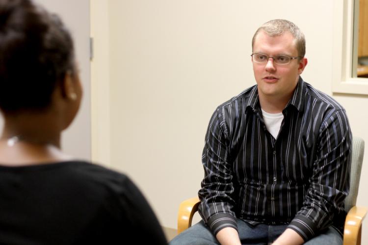 graduate student Nathaniel Briggs works as a counselor-in-training at the university's Counseling Clinic